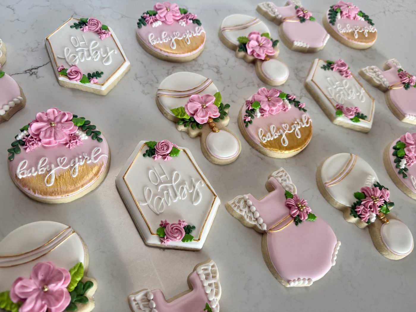 Pink and gold baby shower sugar cookies with piped flowers — Oh Baby and Baby Girl designs